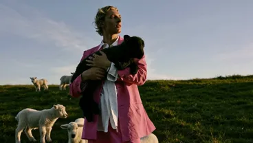 MiniMax H3 2K reference-to-video: pink suit man holding a lamb